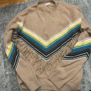 100% cashmere sweater with fringe detail. Size small